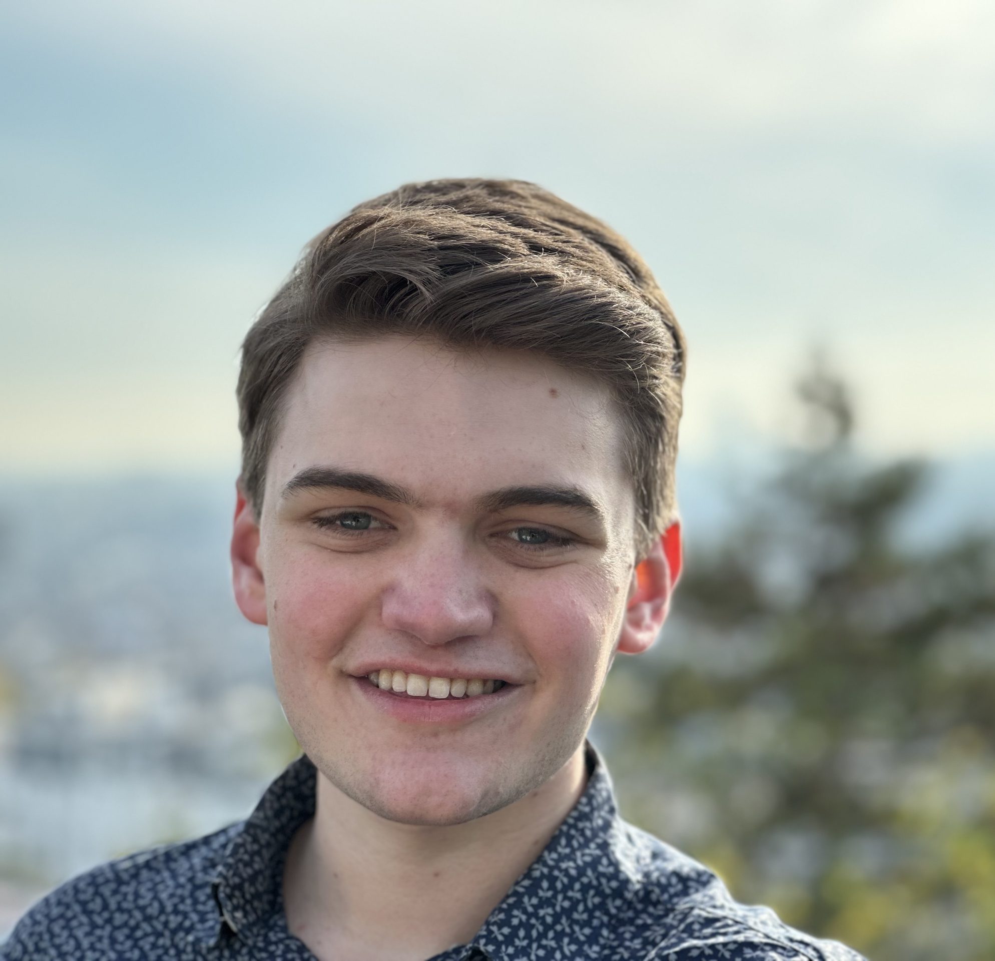 Man in his mid-twenties, smiling